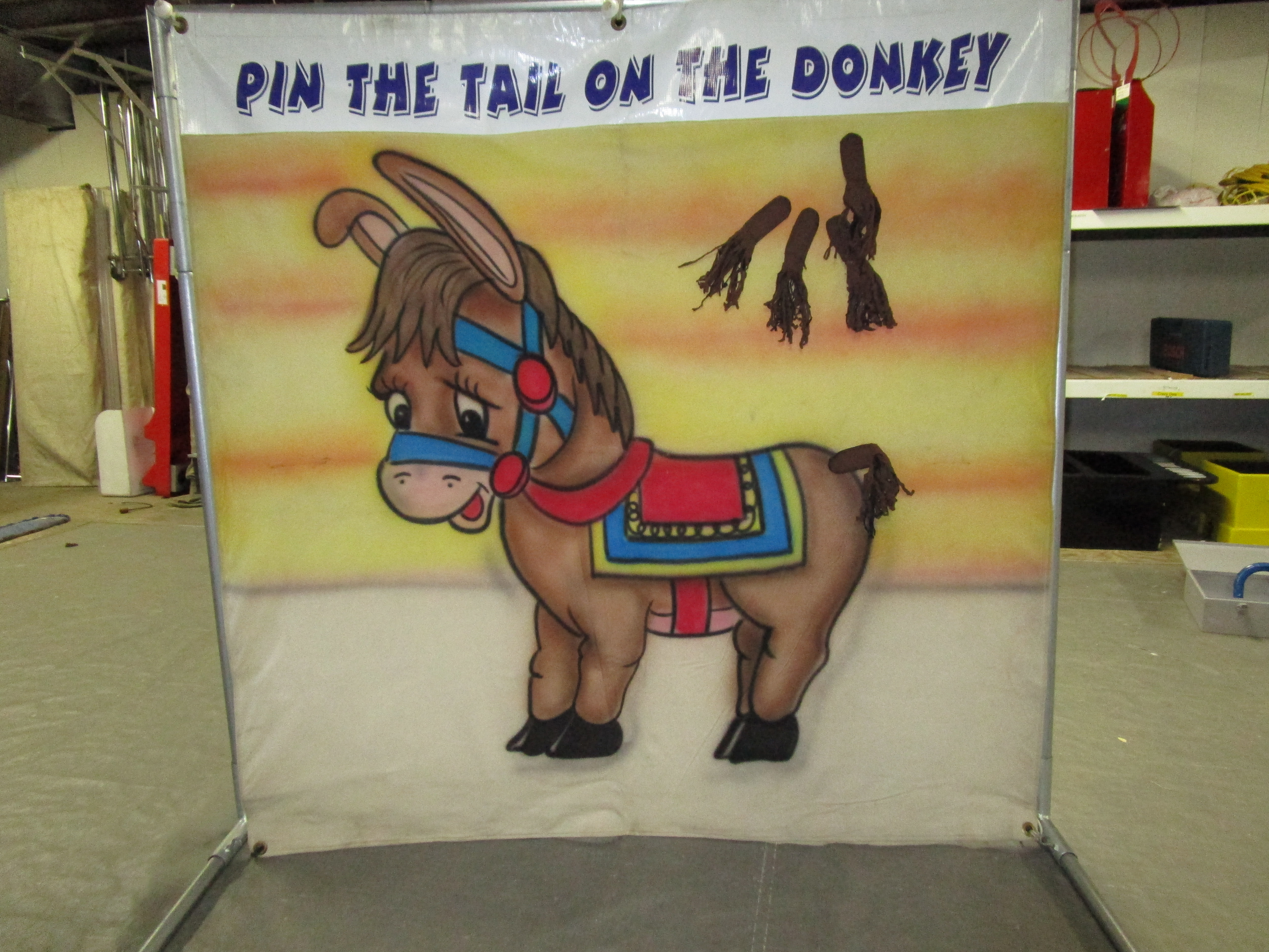kids playing pin the tail on the donkey